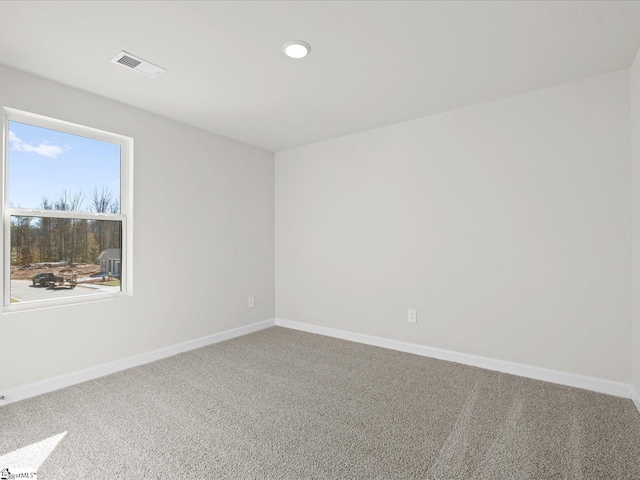 view of carpeted spare room