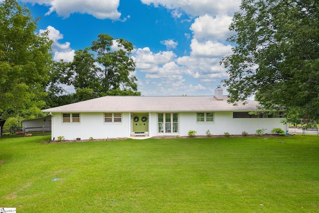 ranch-style house with a front yard