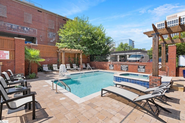 view of pool featuring a patio, a hot tub, and a pergola