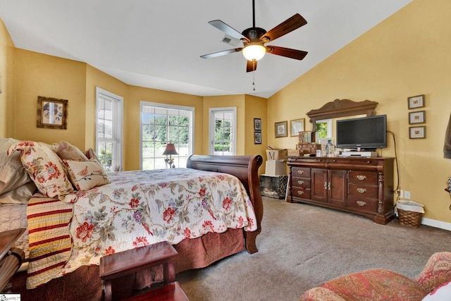 carpeted bedroom with lofted ceiling and ceiling fan