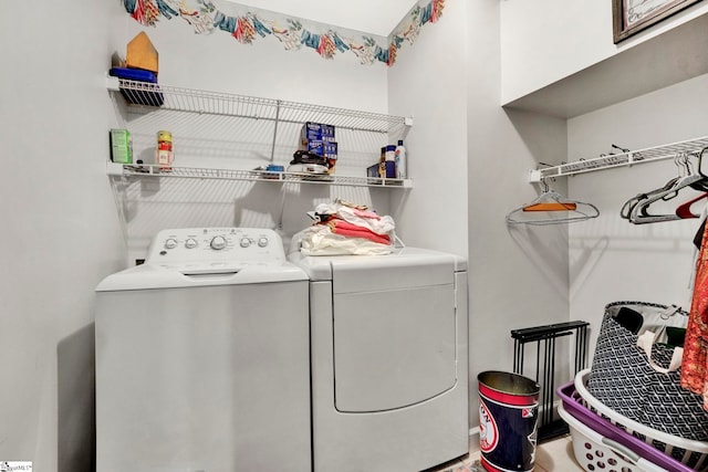 laundry area with separate washer and dryer