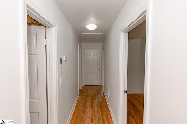 corridor featuring light wood-type flooring