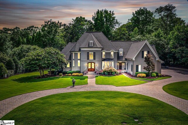 view of front of home with a front lawn