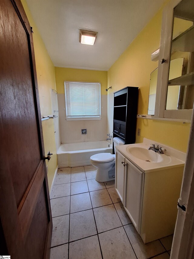 full bathroom featuring tile patterned flooring, toilet, vanity, and shower / bathtub combination