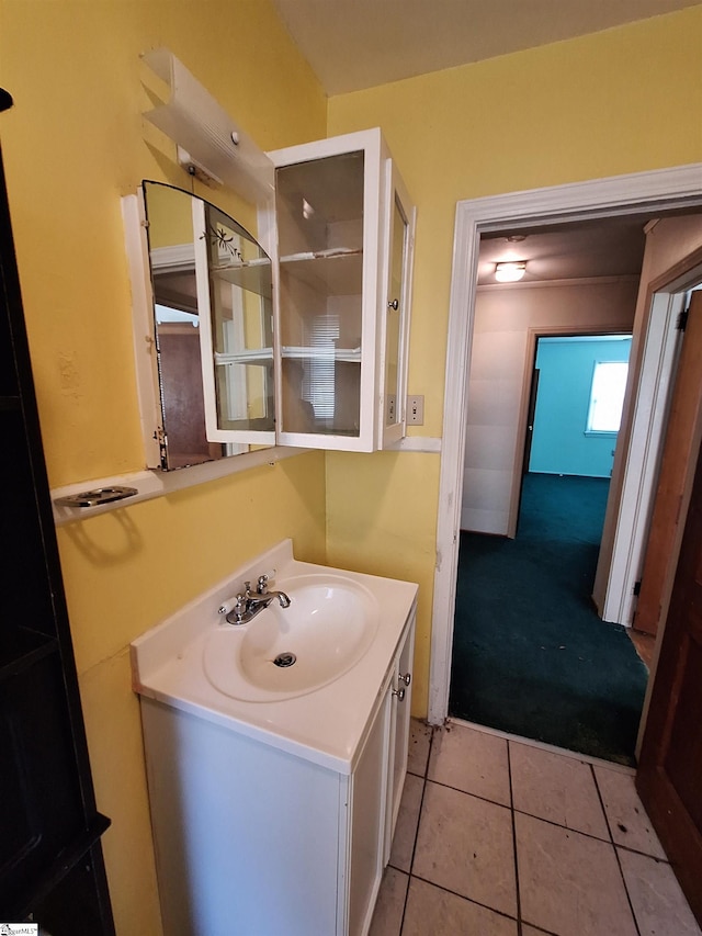 bathroom with vanity and tile patterned flooring