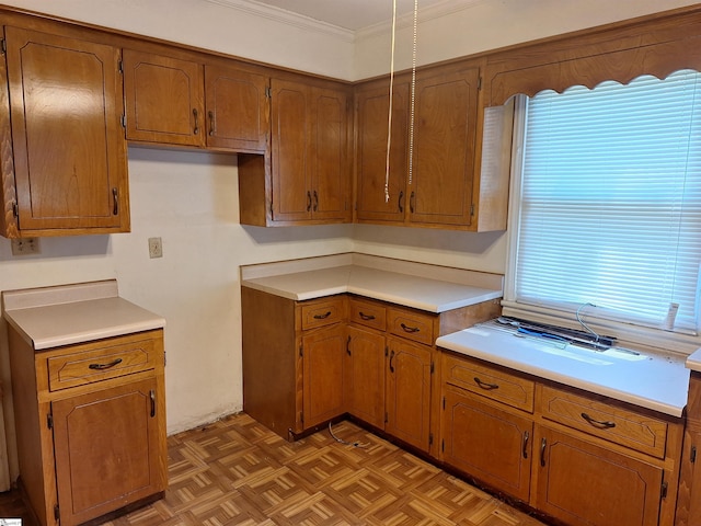 kitchen featuring ornamental molding and parquet floors