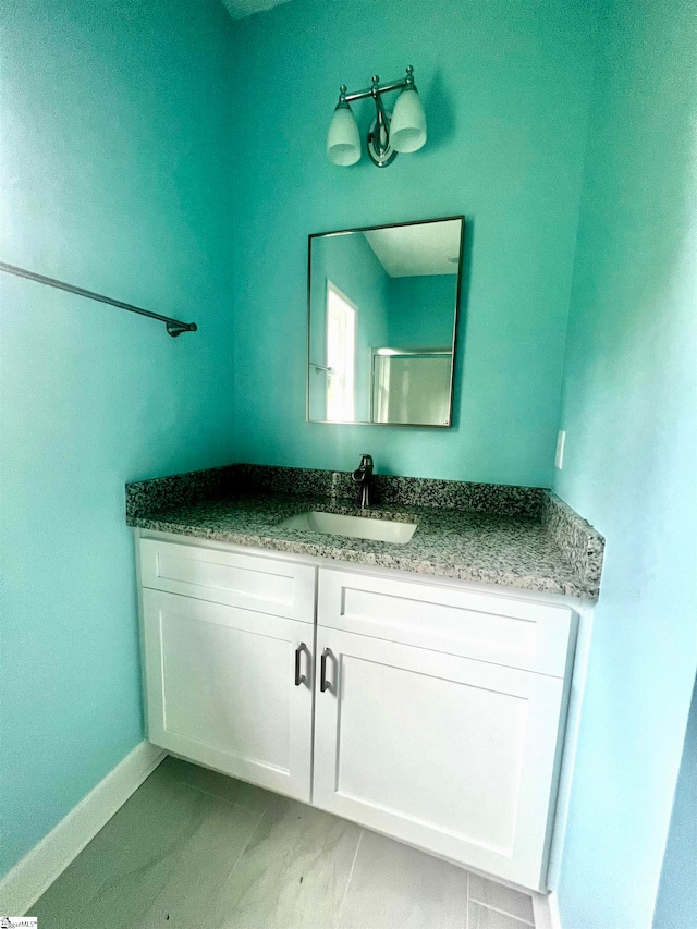 bathroom featuring vanity and tile patterned floors