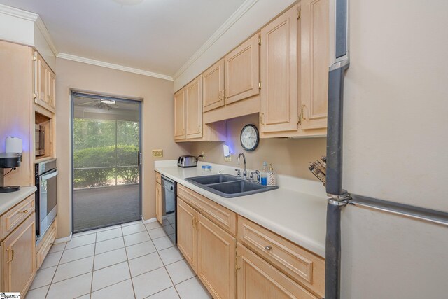 kitchen with crown molding, light countertops, appliances with stainless steel finishes, light brown cabinets, and a sink