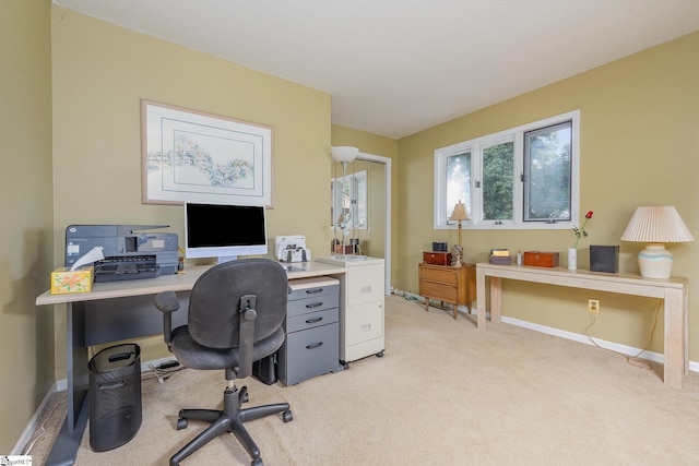 office space with light colored carpet and baseboards