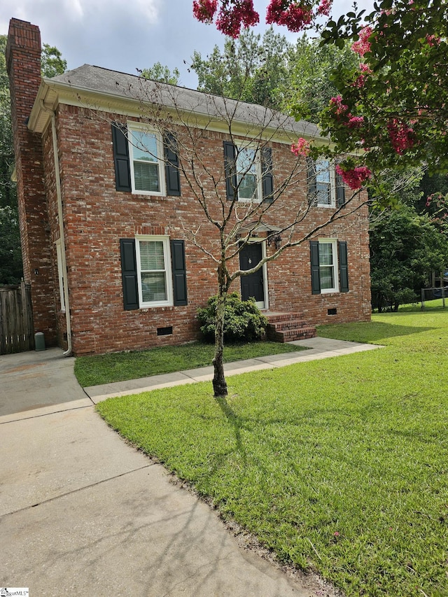 colonial house with a front yard