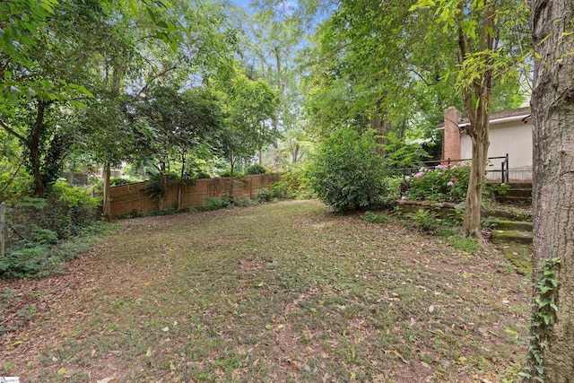 view of yard with fence