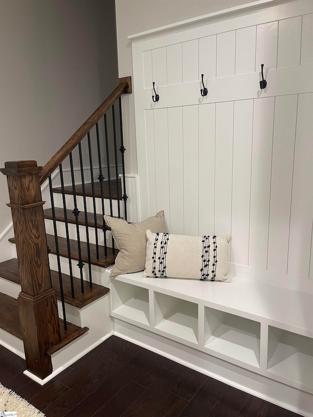 mudroom with dark hardwood / wood-style floors