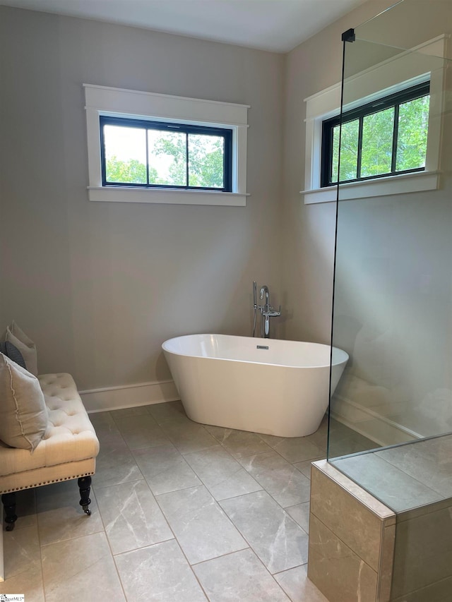 bathroom with a tub