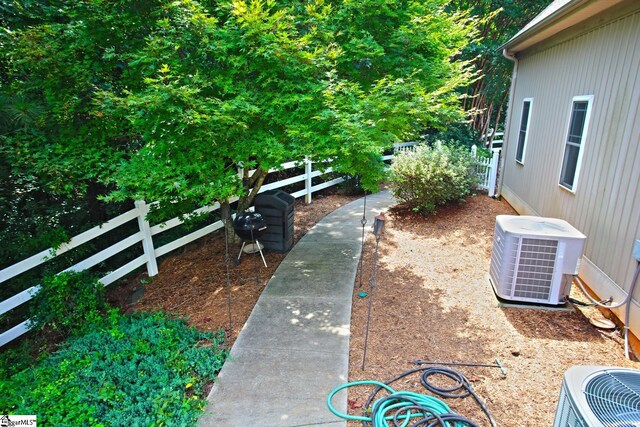 view of yard featuring cooling unit