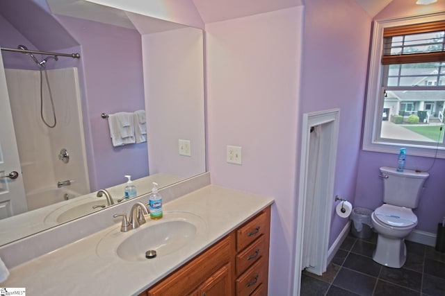 full bathroom with vanity, toilet, tile patterned floors, and  shower combination