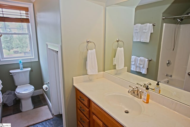 full bathroom with tile patterned flooring, washtub / shower combination, toilet, and vanity