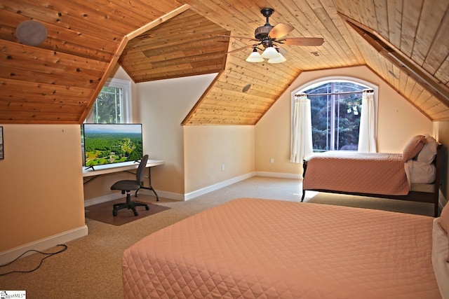 unfurnished bedroom featuring wood ceiling, light carpet, ceiling fan, and vaulted ceiling