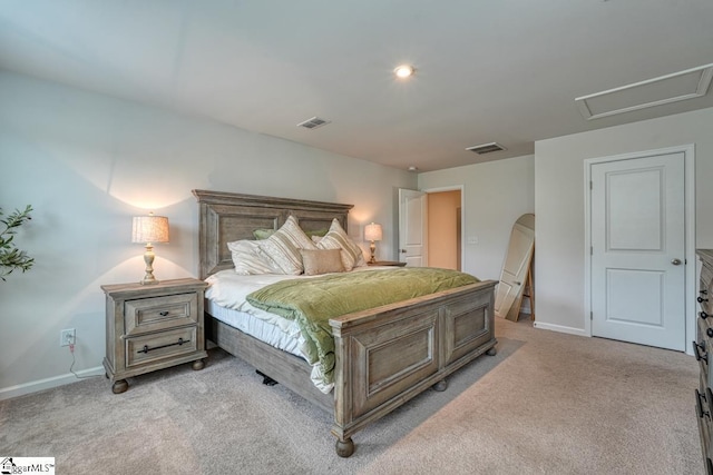 bedroom with light colored carpet