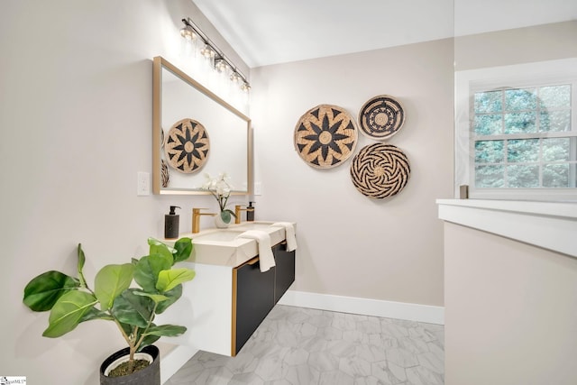 bathroom with tile patterned floors and double sink vanity