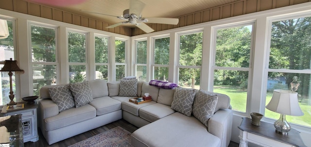 sunroom / solarium with a wealth of natural light and ceiling fan