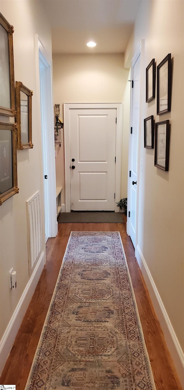 hall featuring dark hardwood / wood-style flooring