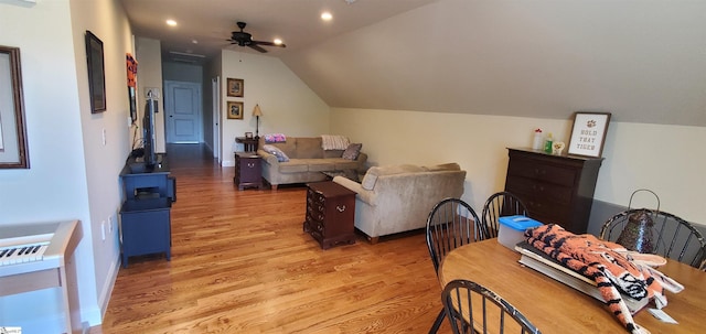 interior space featuring hardwood / wood-style flooring, lofted ceiling, and ceiling fan