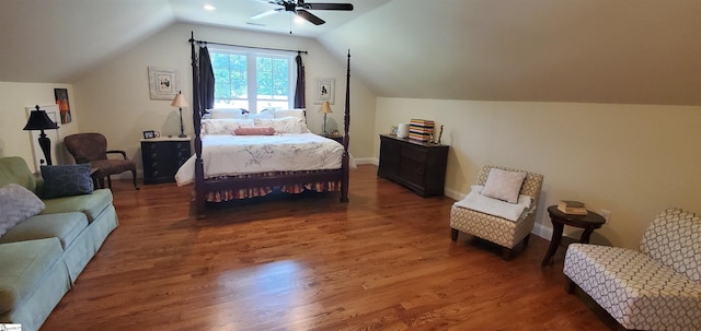 bedroom featuring vaulted ceiling, ceiling fan, and hardwood / wood-style floors