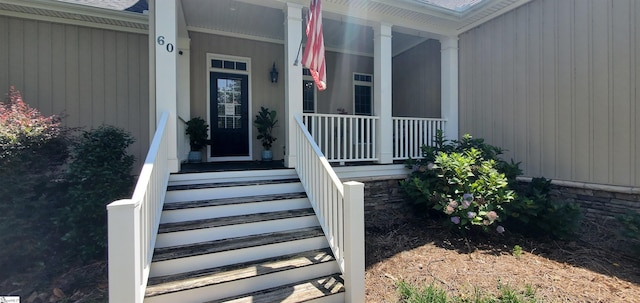 entrance to property with covered porch