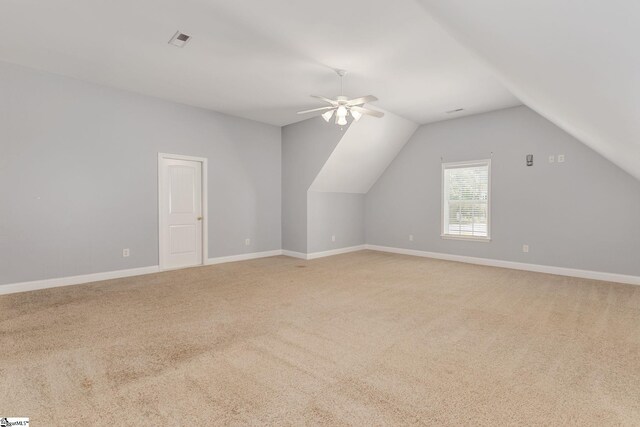 bonus room with carpet, ceiling fan, and vaulted ceiling