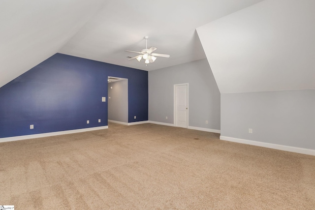 bonus room with carpet flooring, lofted ceiling, and ceiling fan