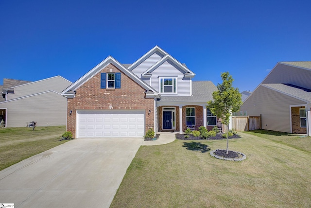 view of front of house featuring a garage, a front lawn, and covered porch