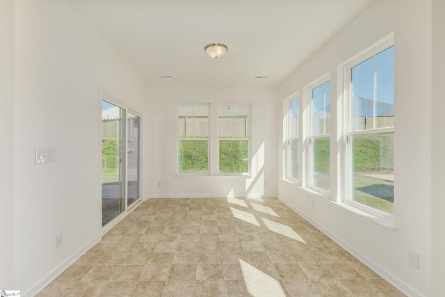 spare room with light tile patterned floors