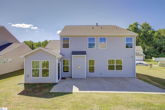 back of property featuring a patio and a lawn