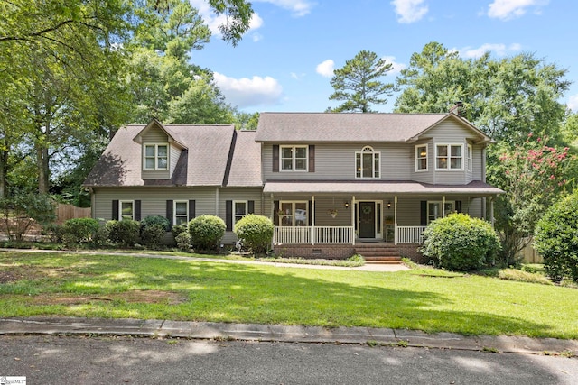 view of front of property featuring a front lawn and a porch