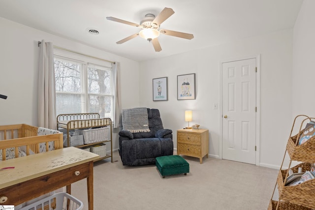 carpeted bedroom with ceiling fan