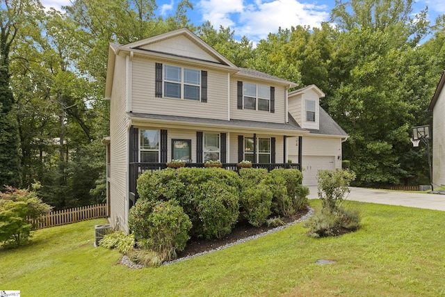 view of front facade featuring a garage, covered porch, and a front lawn