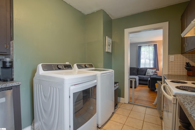 washroom with light tile patterned floors