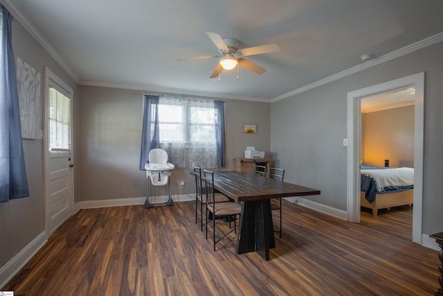 dining area with ceiling fan, ornamental molding, and dark hardwood / wood-style floors