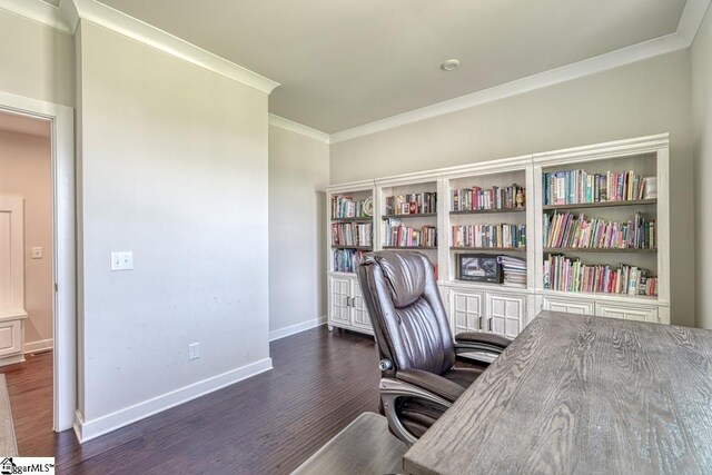 office with crown molding and dark hardwood / wood-style flooring