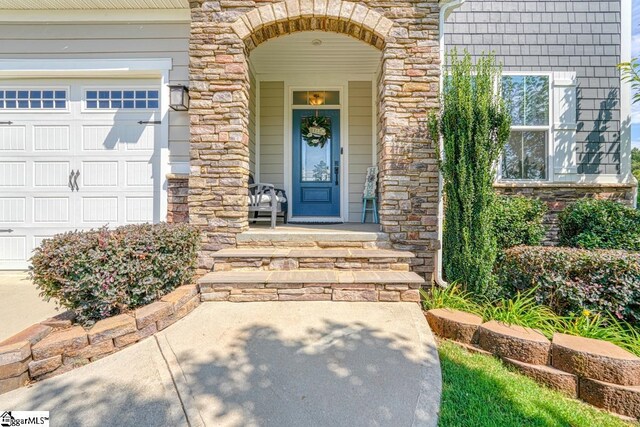 entrance to property with a garage