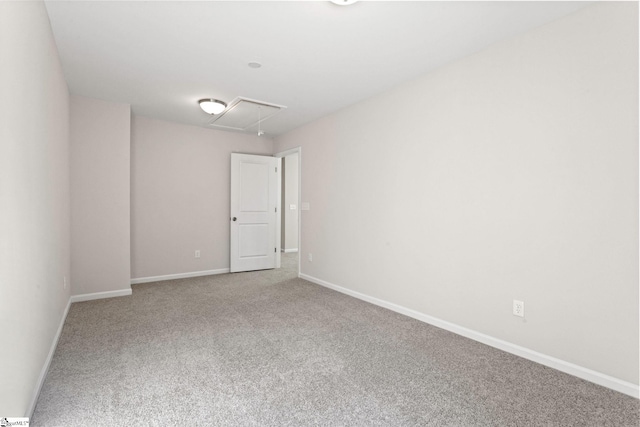 unfurnished room featuring carpet flooring