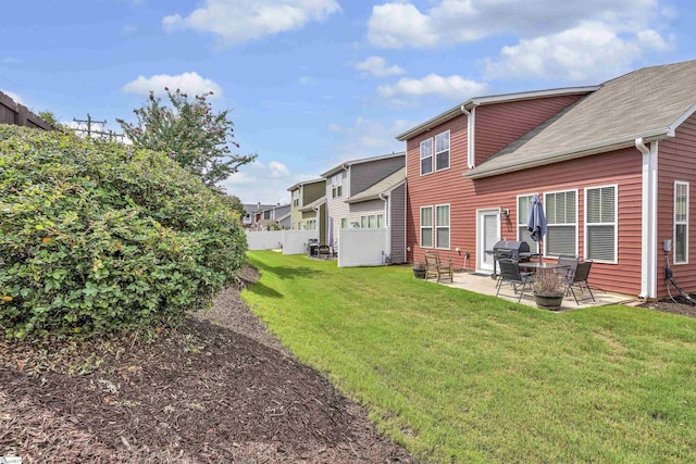 view of yard featuring a patio area and fence