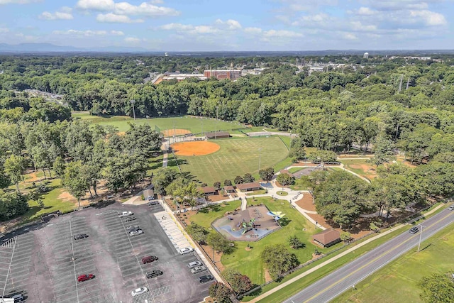 aerial view featuring a view of trees