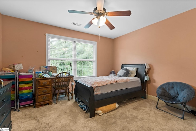 carpeted bedroom featuring ceiling fan