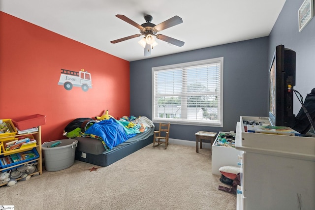 carpeted bedroom with ceiling fan