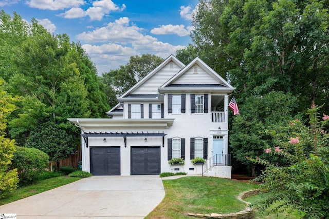 view of front facade featuring fence, an attached garage, concrete driveway, a front lawn, and brick siding