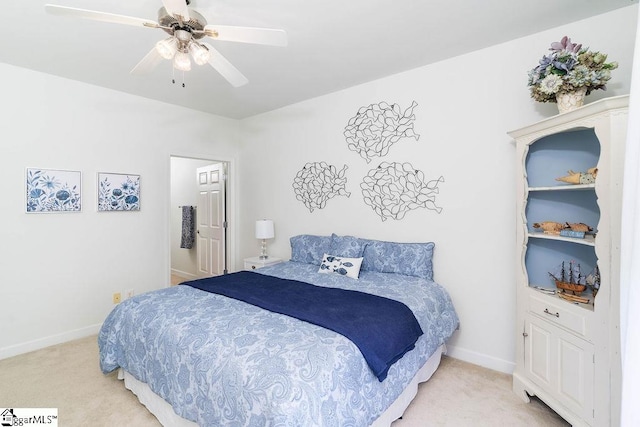 bedroom featuring ceiling fan and light colored carpet