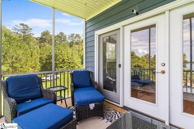 sunroom / solarium featuring plenty of natural light