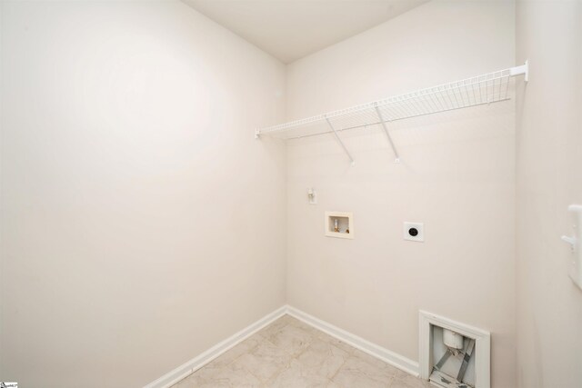 laundry room with hookup for a washing machine, light tile patterned flooring, and hookup for an electric dryer