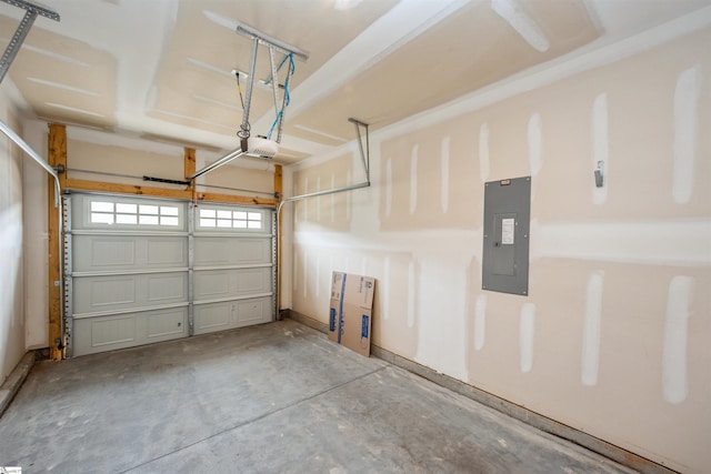 garage with electric panel and a garage door opener